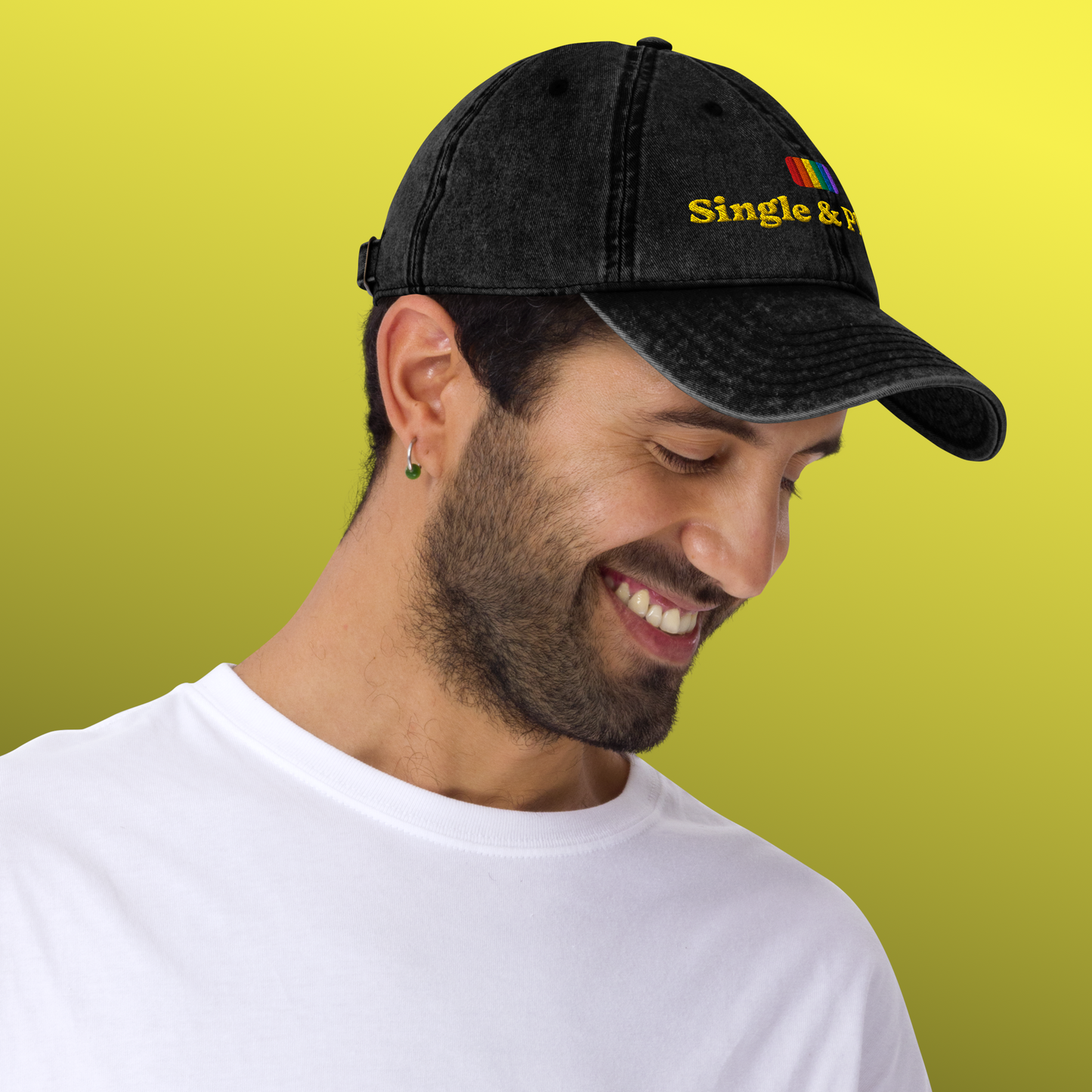 Man wearing a black cap with text on a yellow background