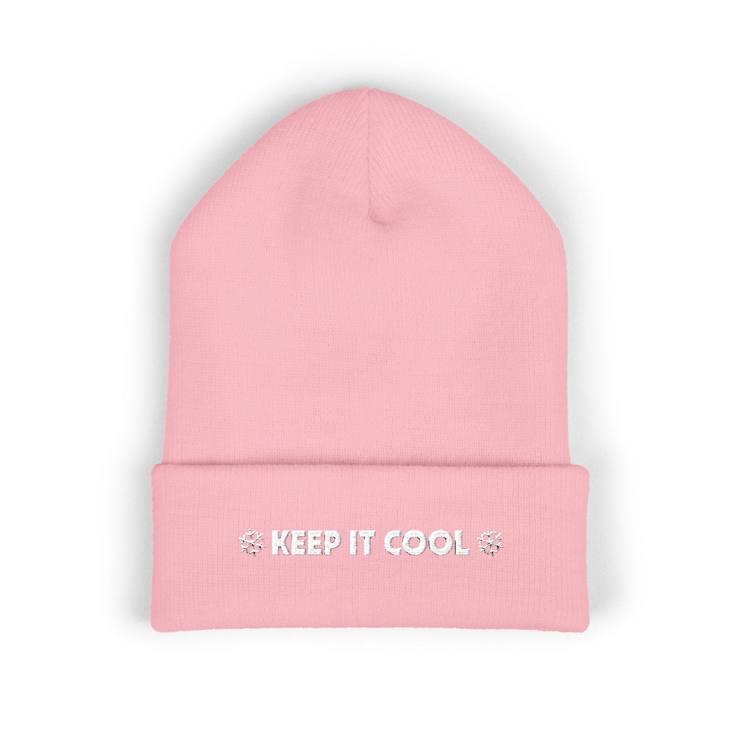 Pink beanie with 'KEEP IT COOL' text on a white background