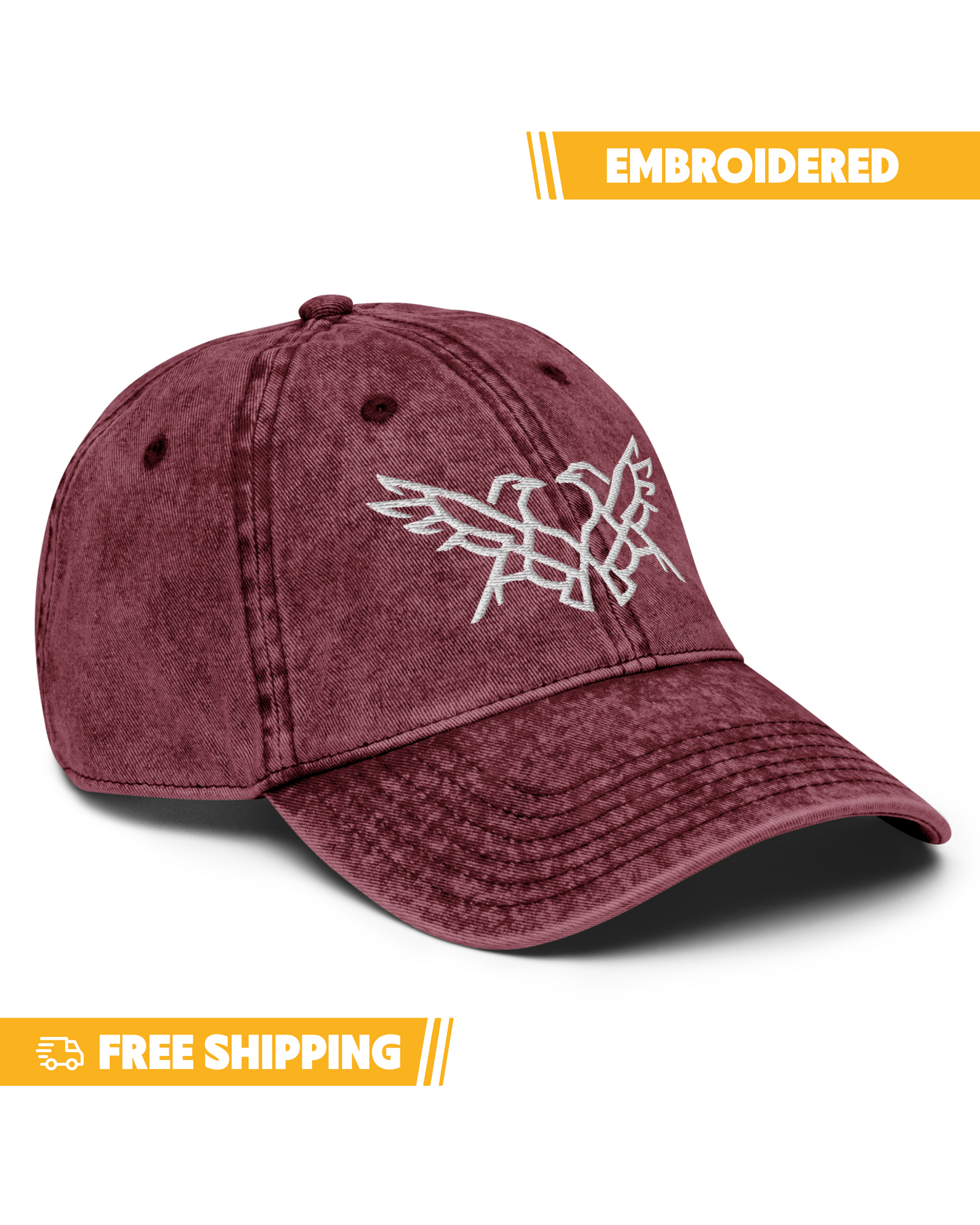 Maroon baseball cap with embroidered design on a white background