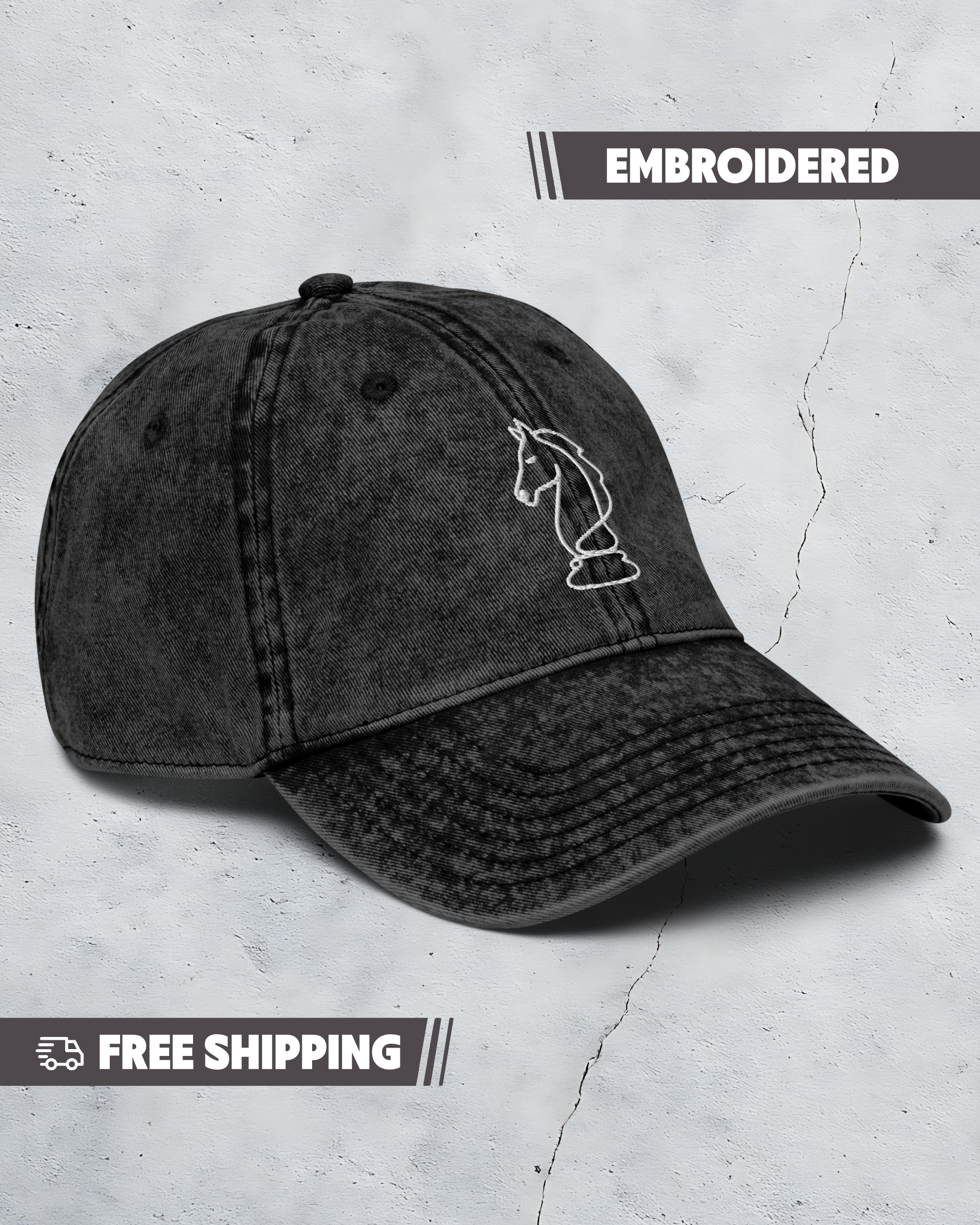 Black embroidered cap on a textured gray background with 'Embroidered' text above.