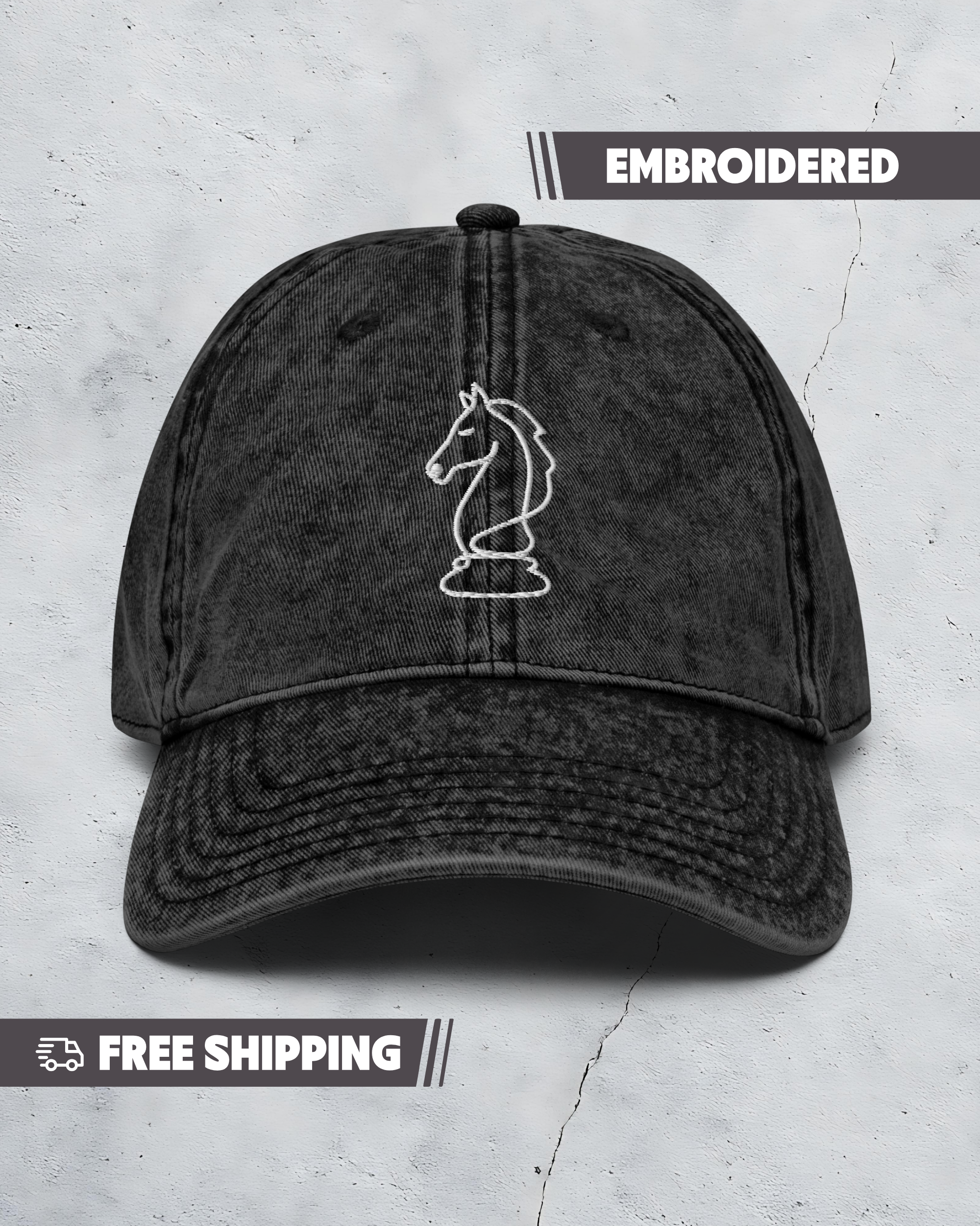 Black embroidered cap with a horse icon on a gray background