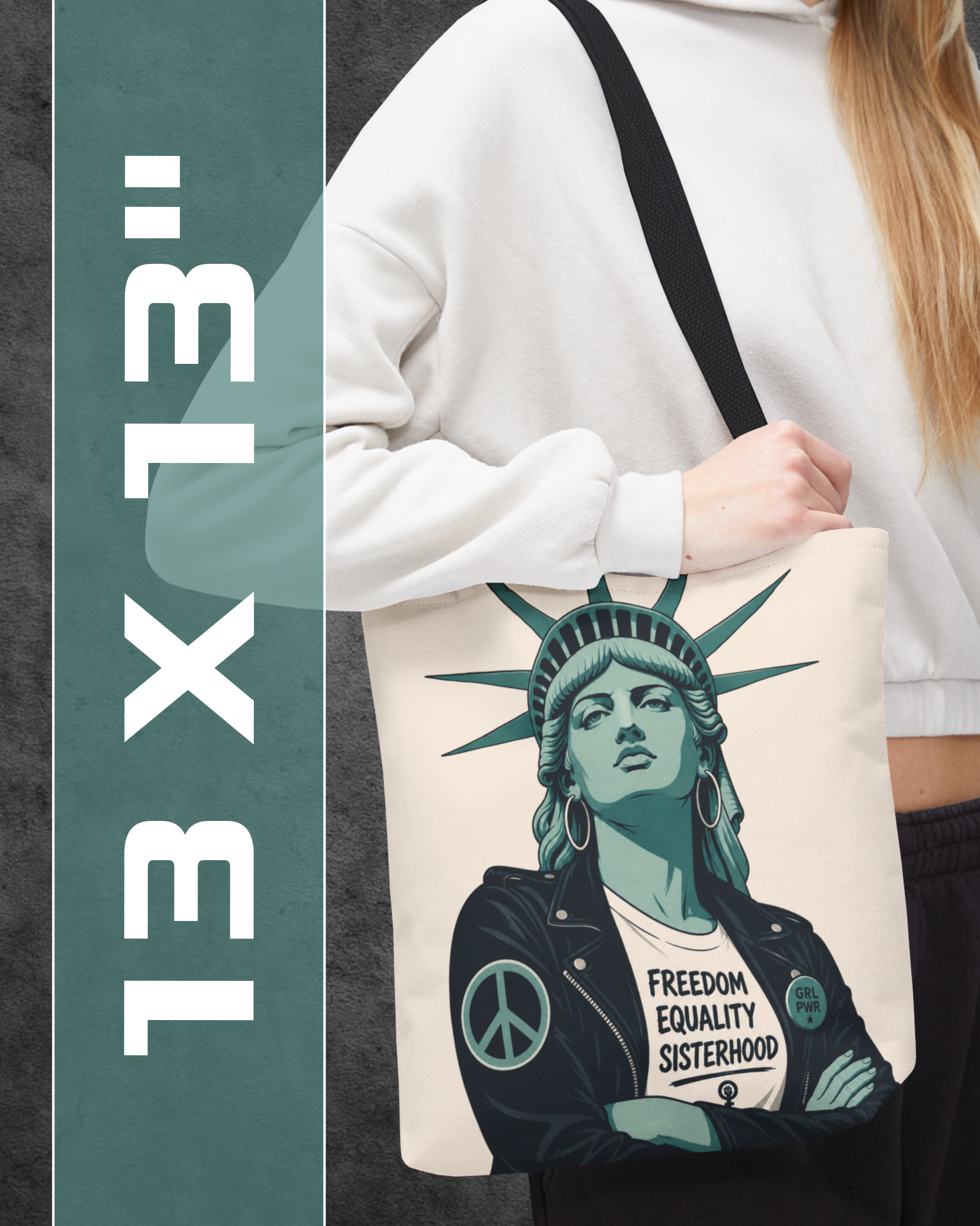 Person holding a tote bag with a graphic design of the Statue of Liberty and text, with '13 x 13' logo on the side.