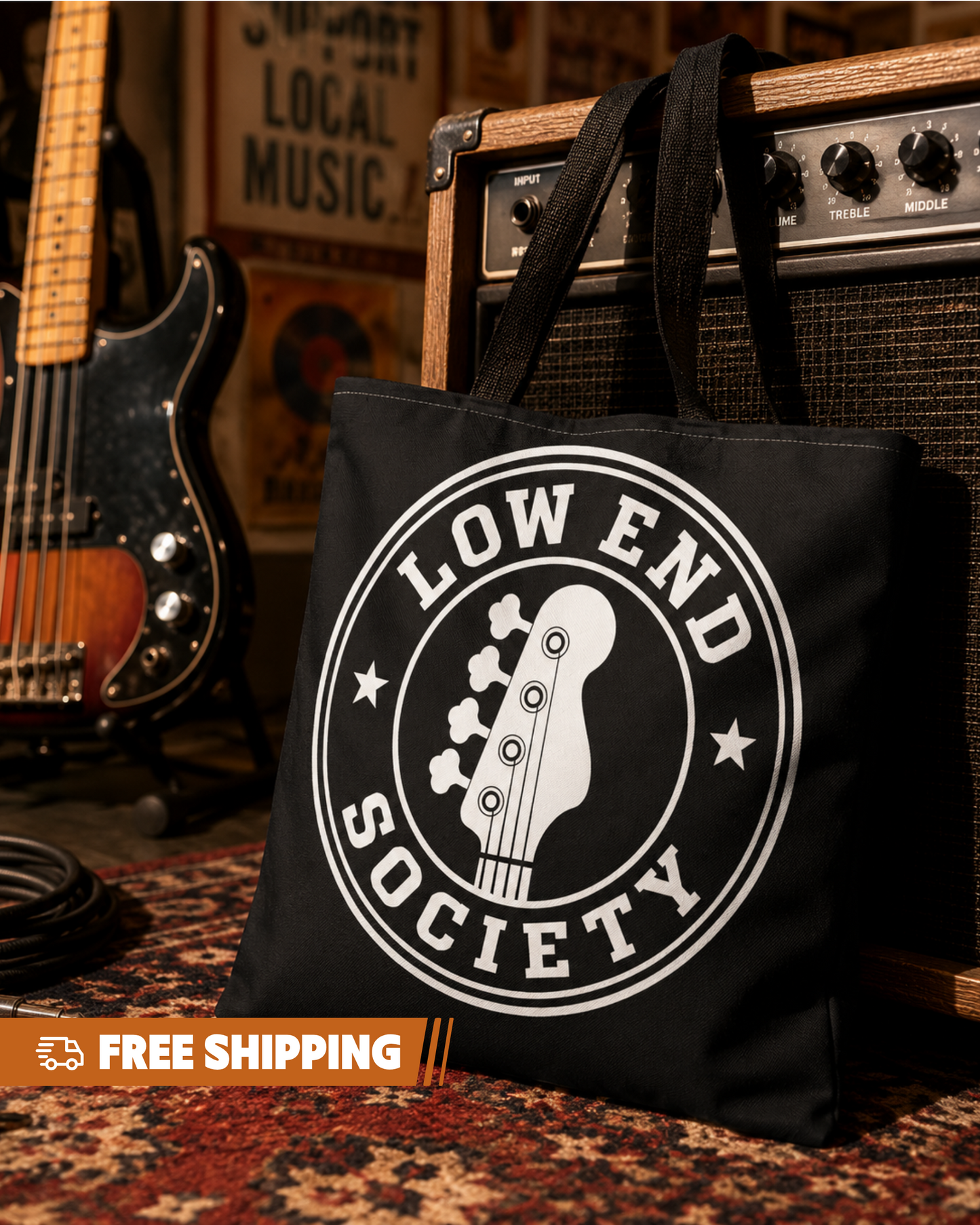 Black tote bag with 'Low End Society' logo in front of a guitar and amplifier.