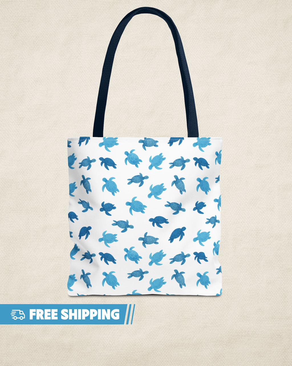 Tote bag with blue turtle pattern on a beige background