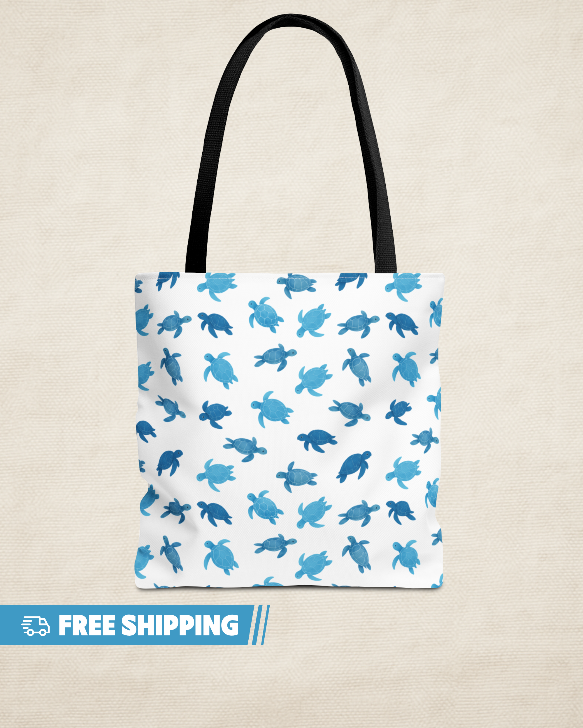 Tote bag with blue turtle pattern on a beige background