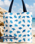 Tote bag with blue turtle pattern on a beach background