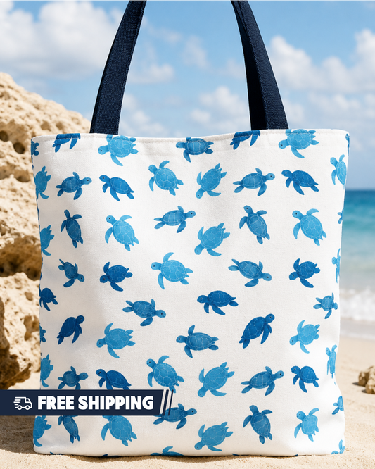 Tote bag with blue turtle pattern on a beach background