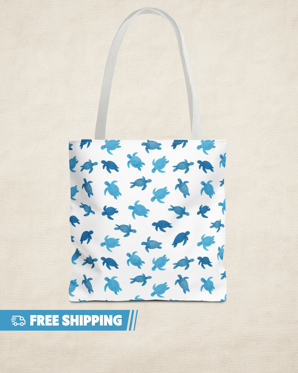 Tote bag with blue turtle pattern on a beige background