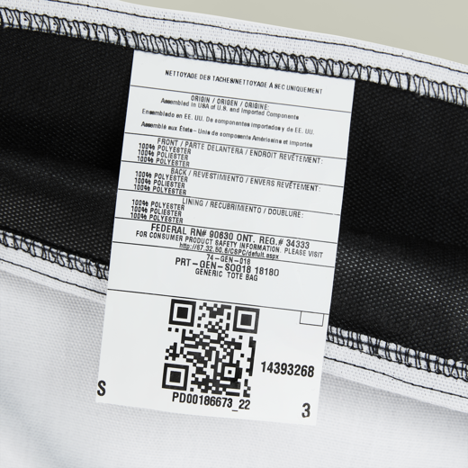 Close-up of a product label with text and a QR code on a white background
